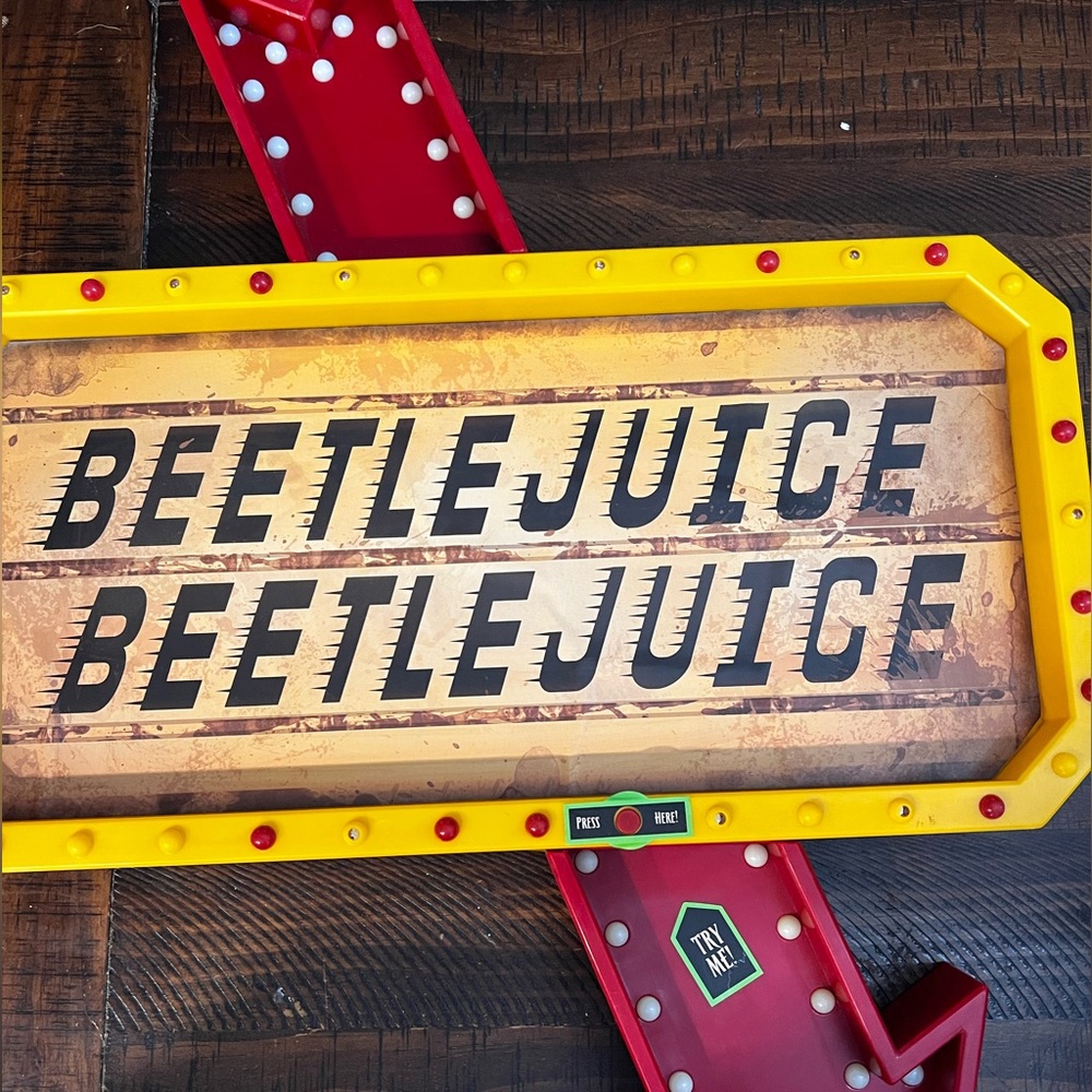 Spirit Yellow and Red Beetlejuice Sign